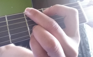 Como tocar guitarra
